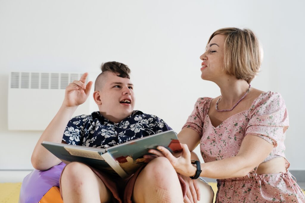 disabled child reading book communicating rehabi 2023 11 27 05 21 12 utc - Lago Homecare